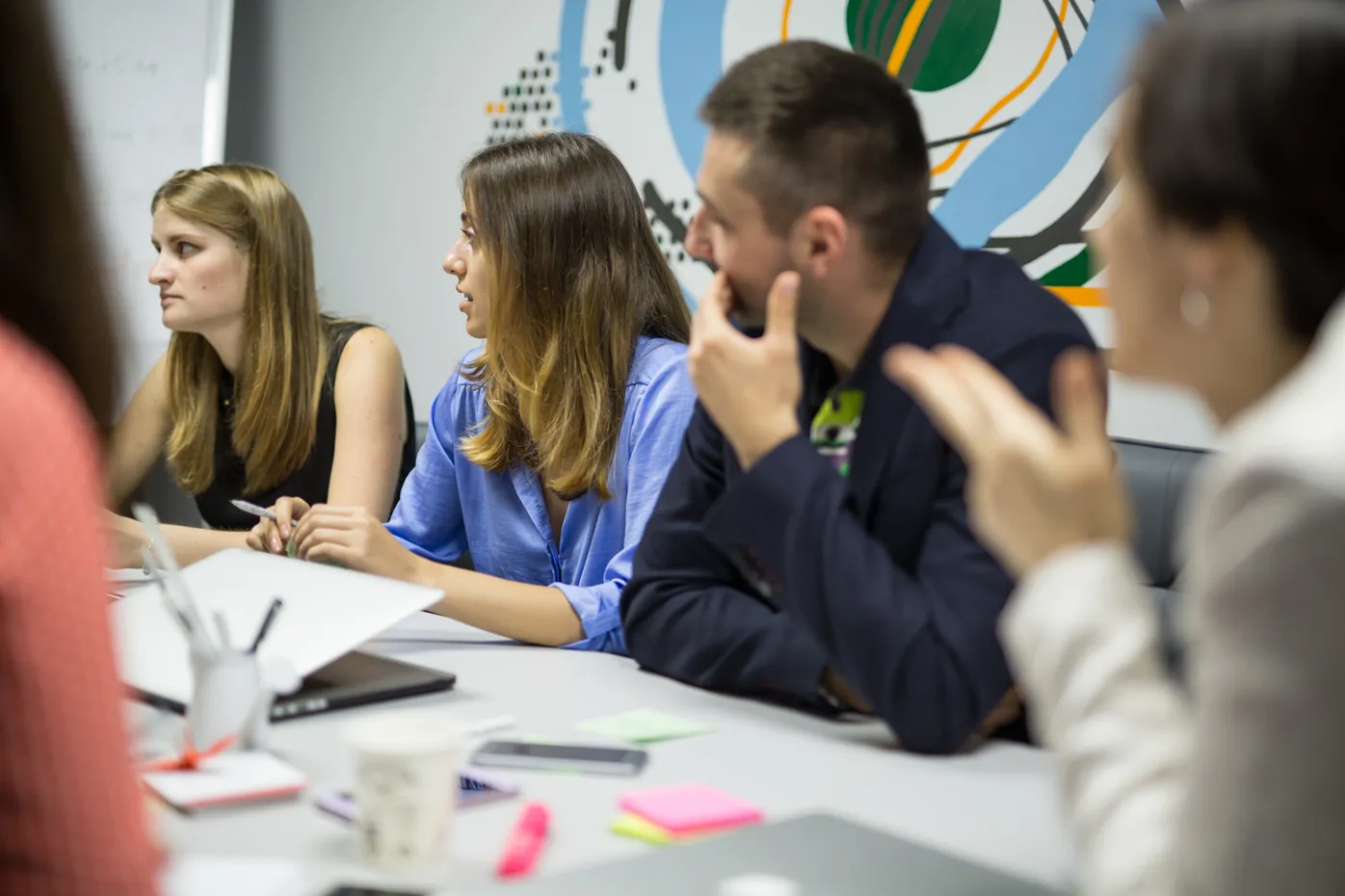 The Skillers team working together around a table